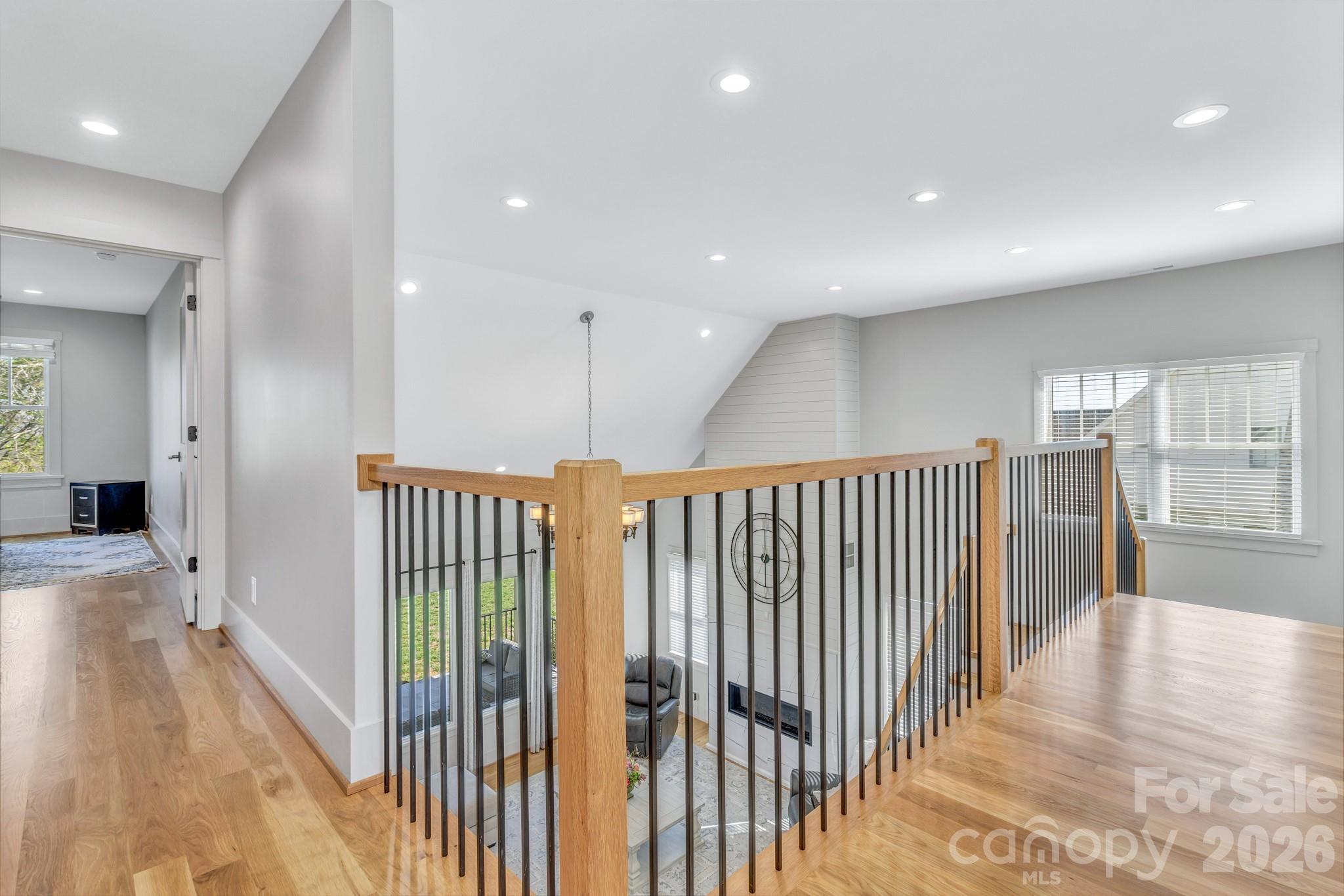 301 Rockbridge Road Mills River, NC 28759 - Photo 31 of 48 a view of a hallway with wooden floor and windows