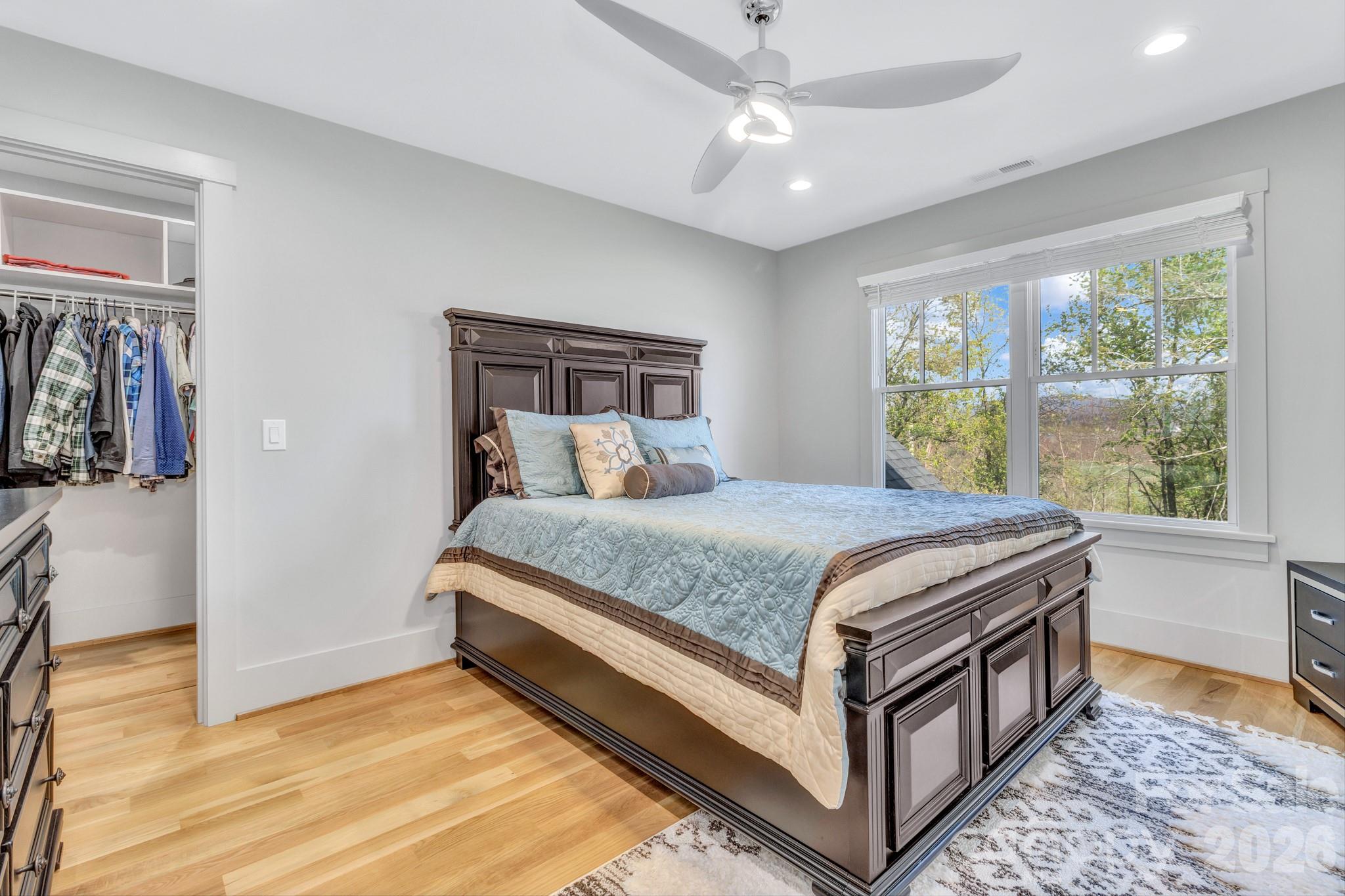 301 Rockbridge Road Mills River, NC 28759 - Photo 32 of 48 a bedroom with a bed and a window