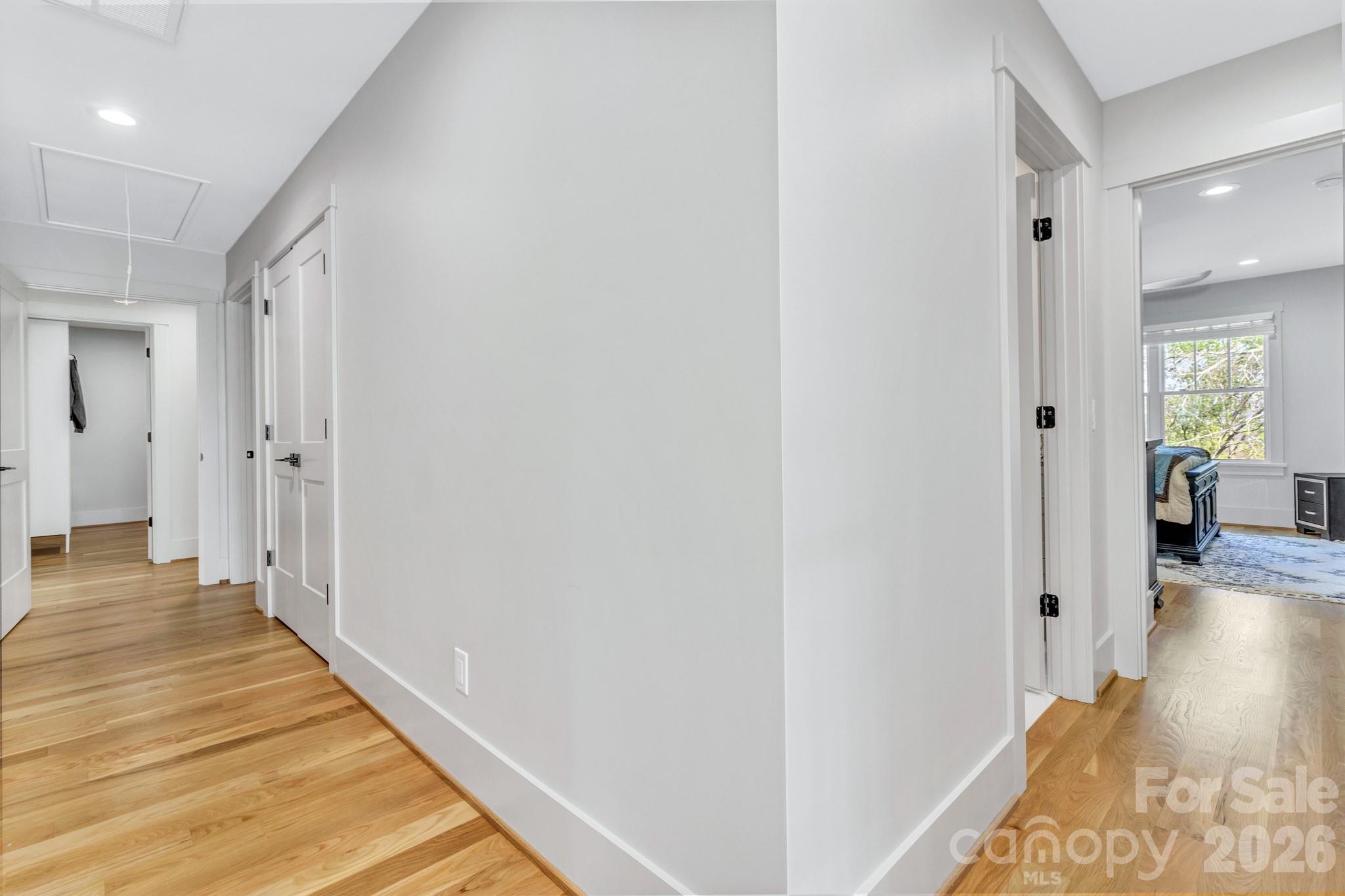301 Rockbridge Road Mills River, NC 28759 - Photo 35 of 48 a view of a hallway with wooden floor and a bathroom