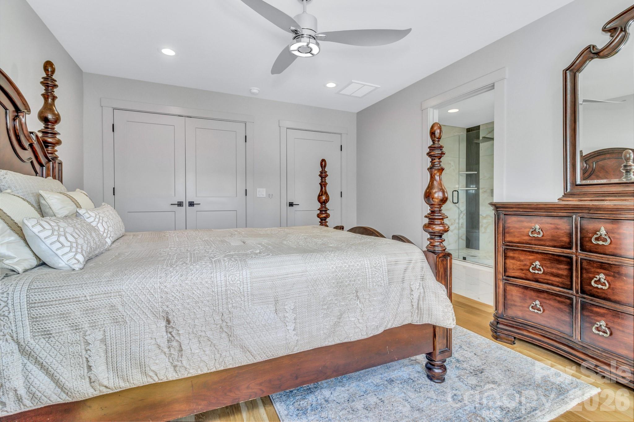 301 Rockbridge Road Mills River, NC 28759 - Photo 37 of 48 a bedroom with a bed and a dresser