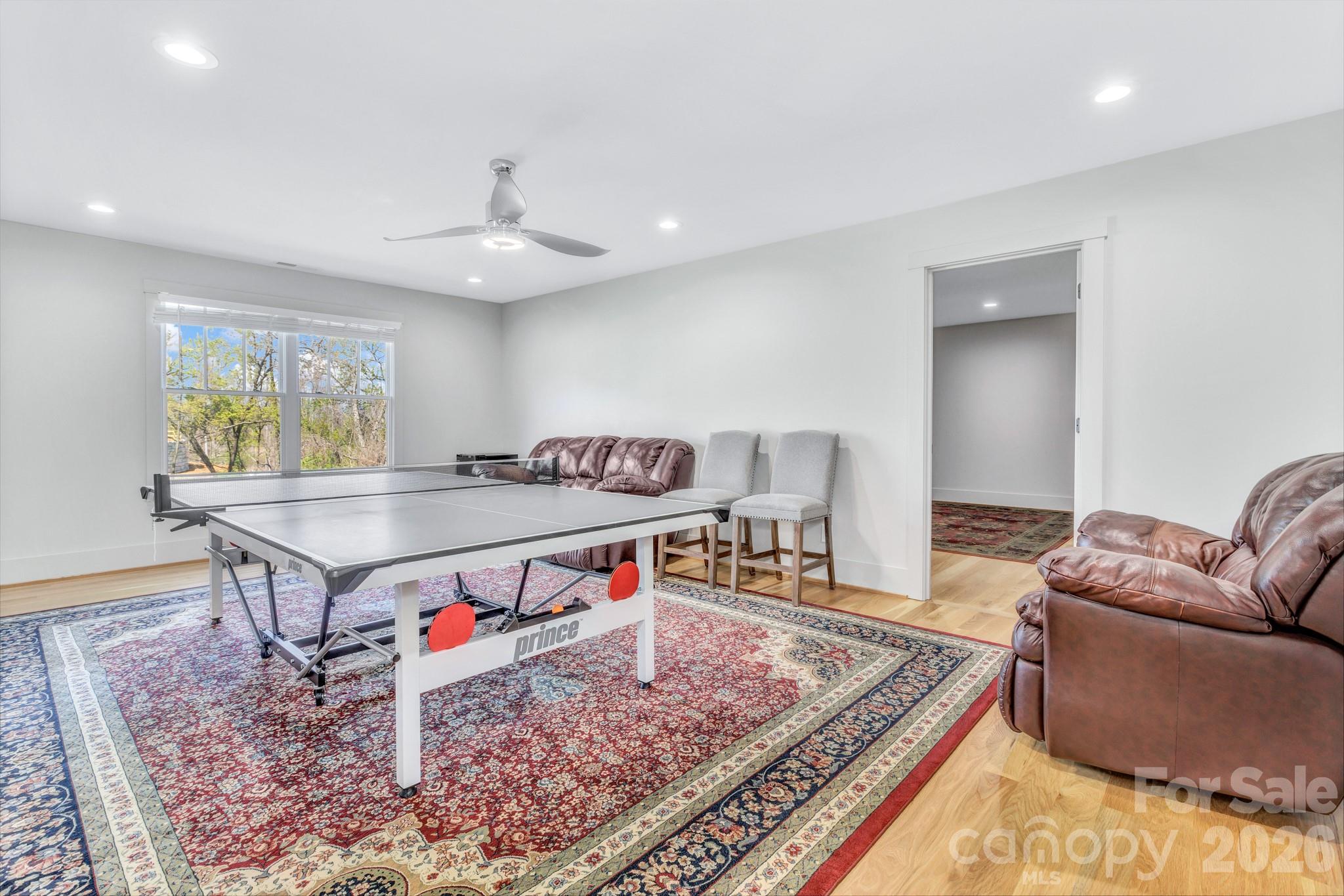 301 Rockbridge Road Mills River, NC 28759 - Photo 43 of 48 a living room with furniture and a rug