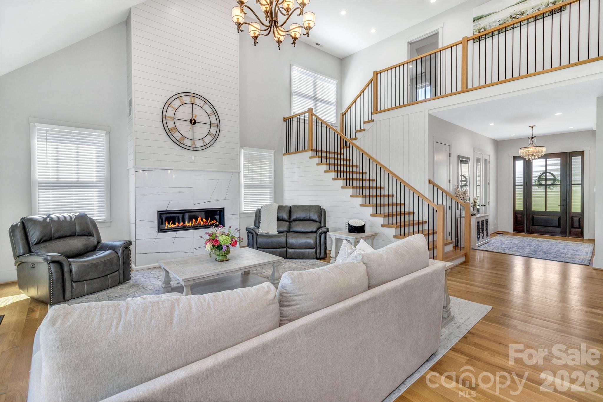 301 Rockbridge Road Mills River, NC 28759 - Photo 9 of 48 a living room with furniture and a fireplace