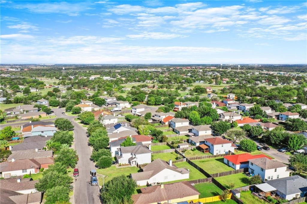 16724 Trevin Cove Manor, TX 78653 - Photo 5 of 32 an aerial view of residential houses with outdoor space and trees