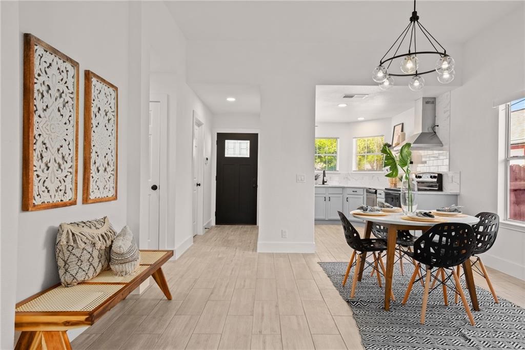 16724 Trevin Cove Manor, TX 78653 - Photo 7 of 32 a view of a dining room with furniture