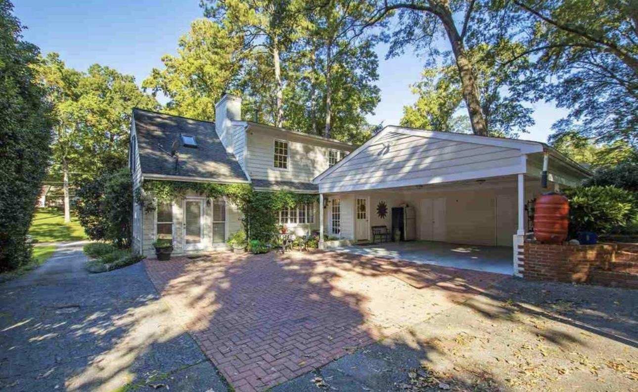 3208 Landor Road Raleigh, NC 27609 - Photo 3 of 3 a view of a house with a yard and tree s