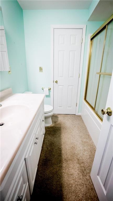 130 Minteer Road Butler, PA 16001 - Photo 14 of 24 a bathroom with a granite countertop sink and a mirror