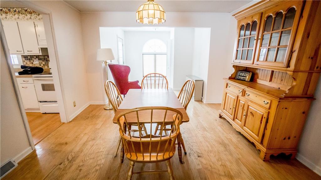 130 Minteer Road Butler, PA 16001 - Photo 8 of 24 a view of a dining room with furniture window and wooden floor