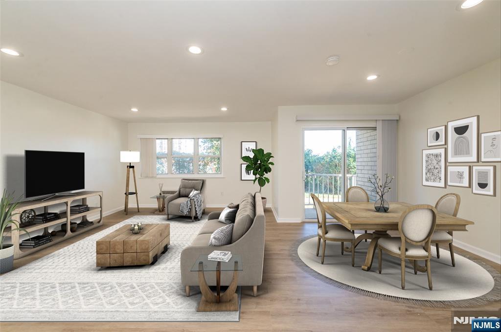1111 River Road, Unit G5 Edgewater, NJ 07020 - Photo 1 of 20 a living room with furniture and a flat screen tv