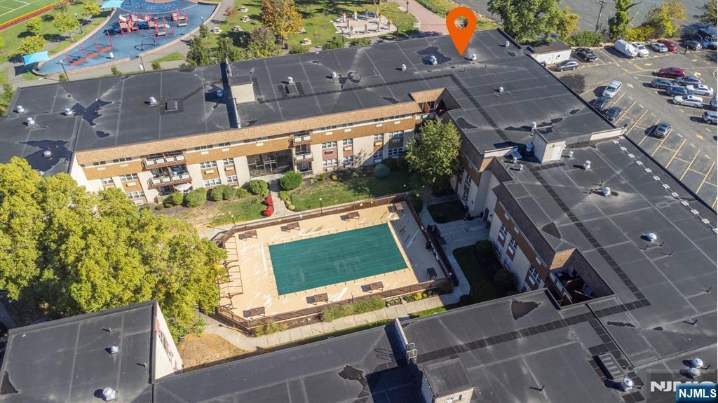 1111 River Road, Unit G5 Edgewater, NJ 07020 - Photo 18 of 20 an aerial view of a large building with an outdoor space