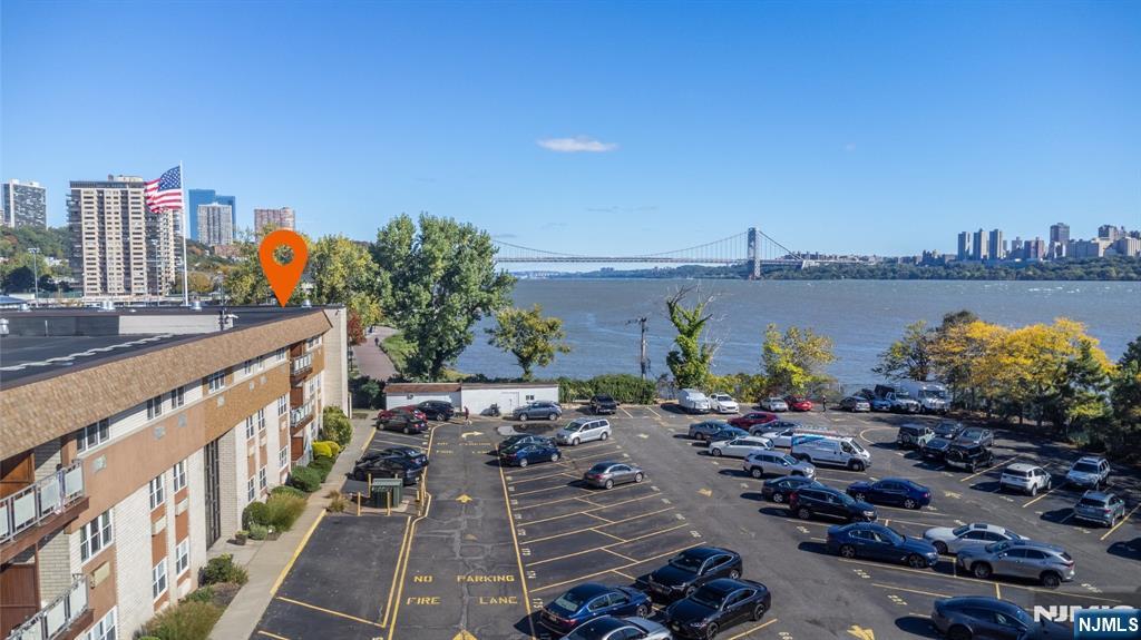 1111 River Road, Unit G5 Edgewater, NJ 07020 - Photo 20 of 20 a view of a lake with a terrace