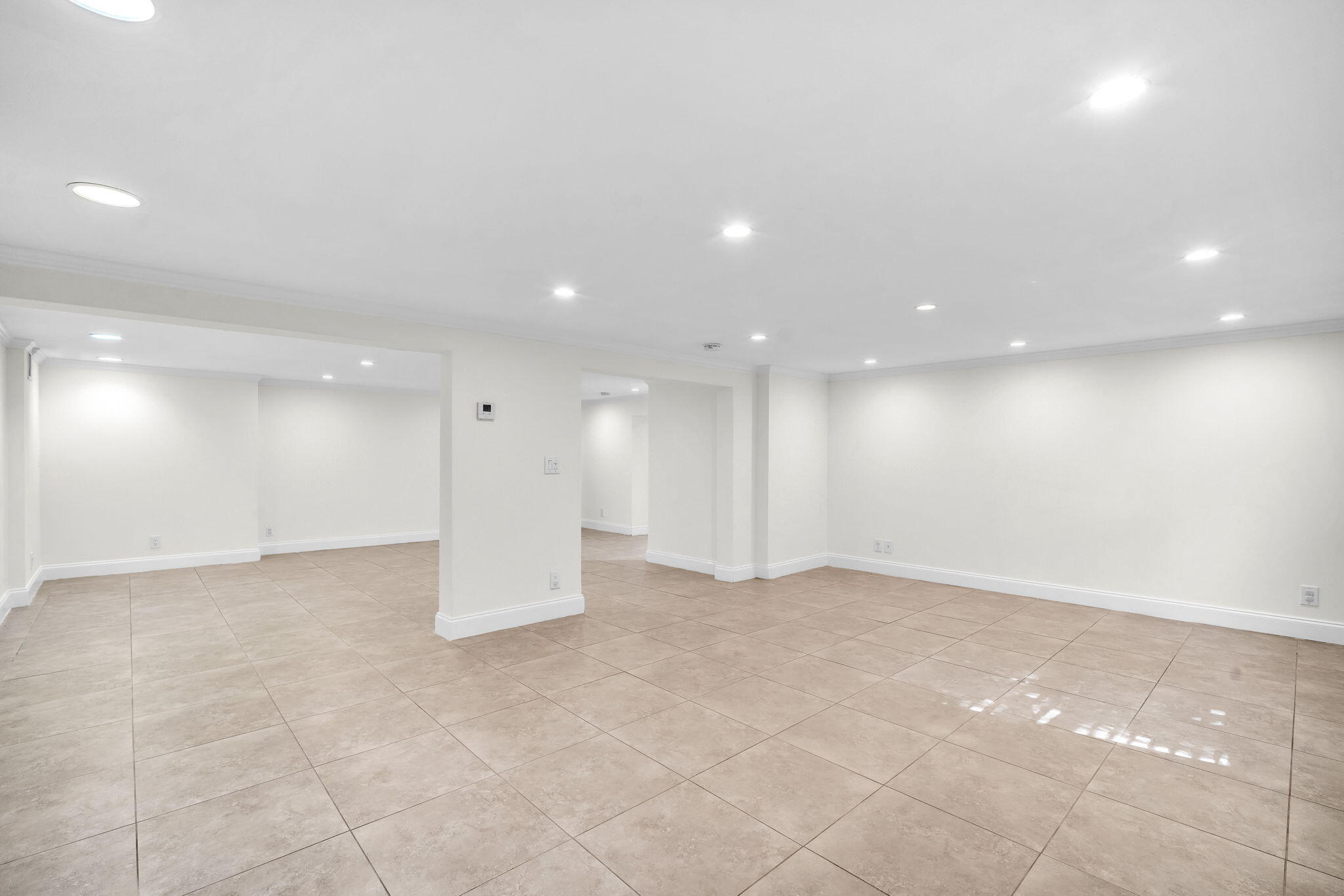 144 Northwest 4th Avenue Boca Raton, FL 33432 - Photo 25 of 35 an empty room with an entryway
