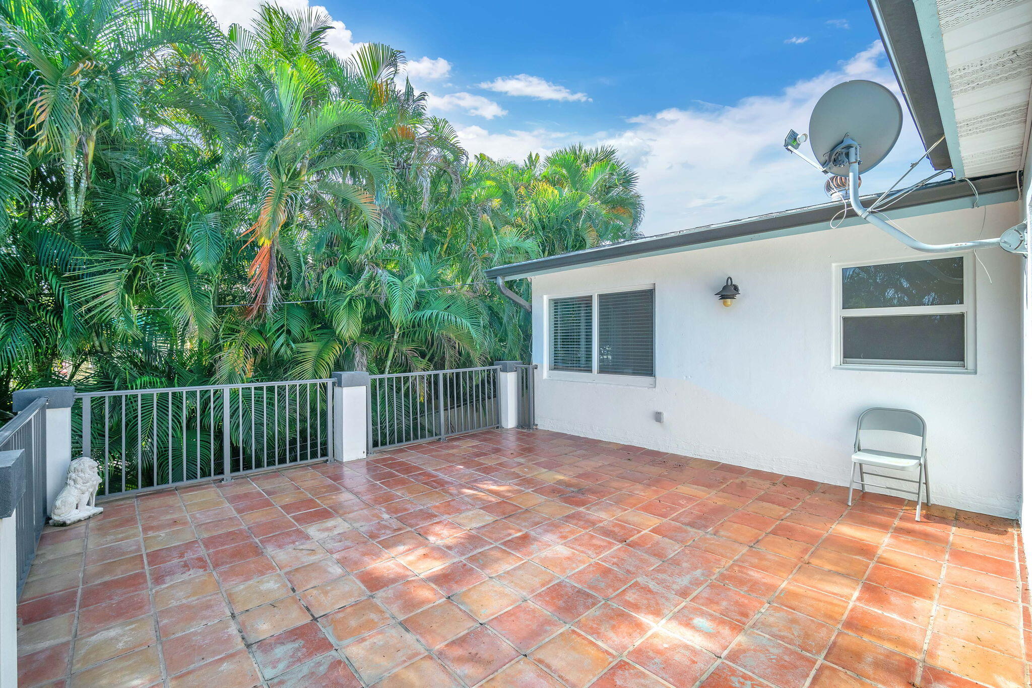 144 Northwest 4th Avenue Boca Raton, FL 33432 - Photo 30 of 35 a balcony view with a garden