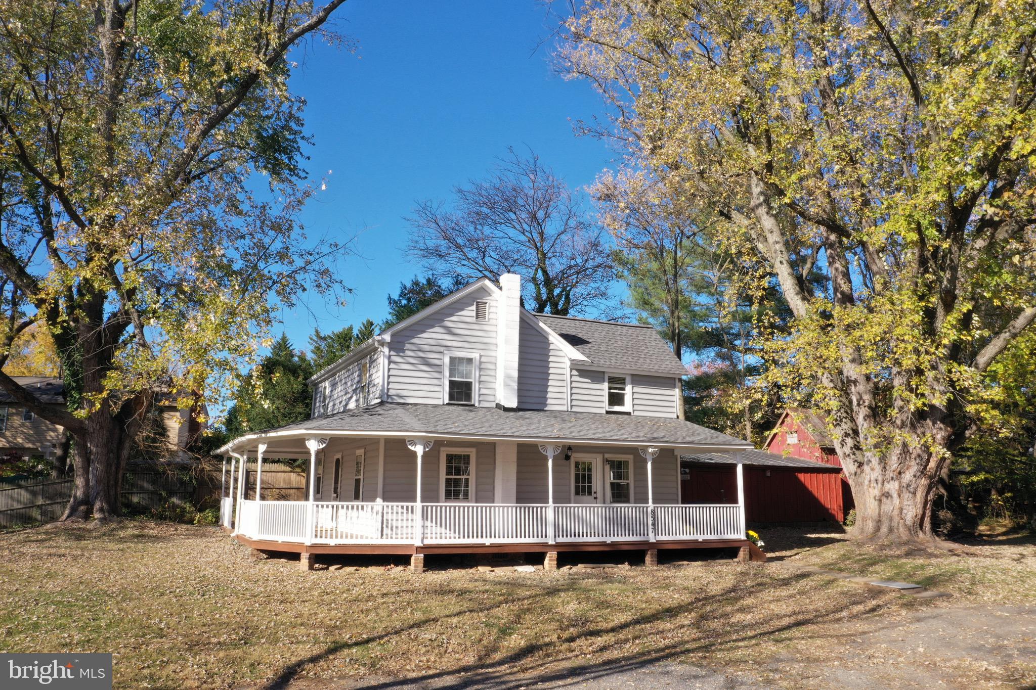 8547 Emory Grove Road Gaithersburg, MD 20877 - Photo 1 of 14 a front view of a house with a yard