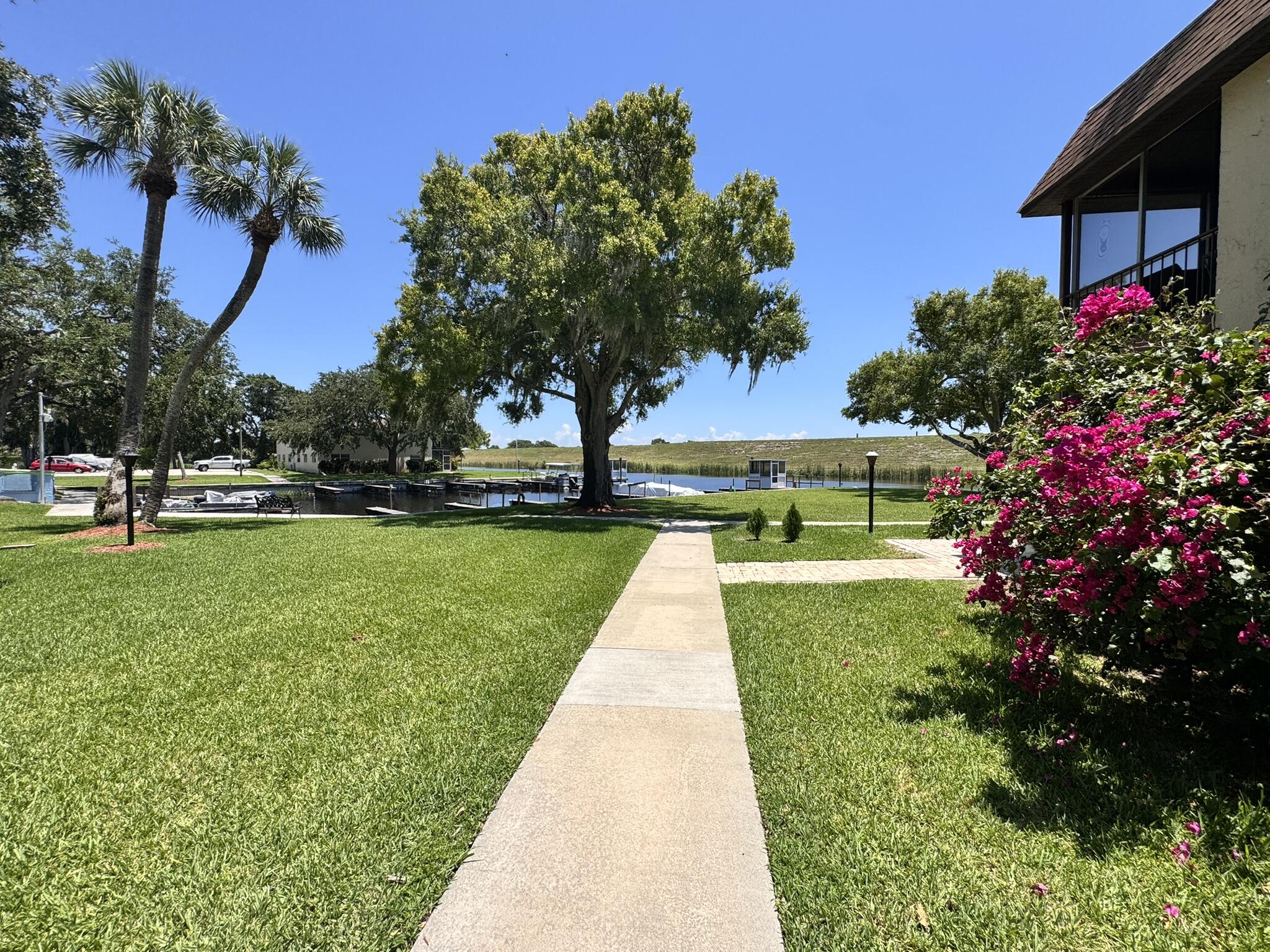 3124 Highway 441, Unit J1 Okeechobee, FL 34974 - Photo 31 of 40 a view of a park with large trees