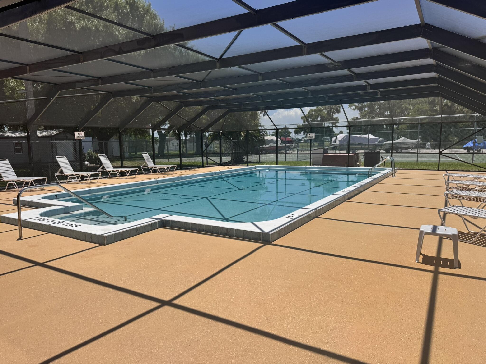 3124 Highway 441, Unit J1 Okeechobee, FL 34974 - Photo 36 of 40 a view of a backyard