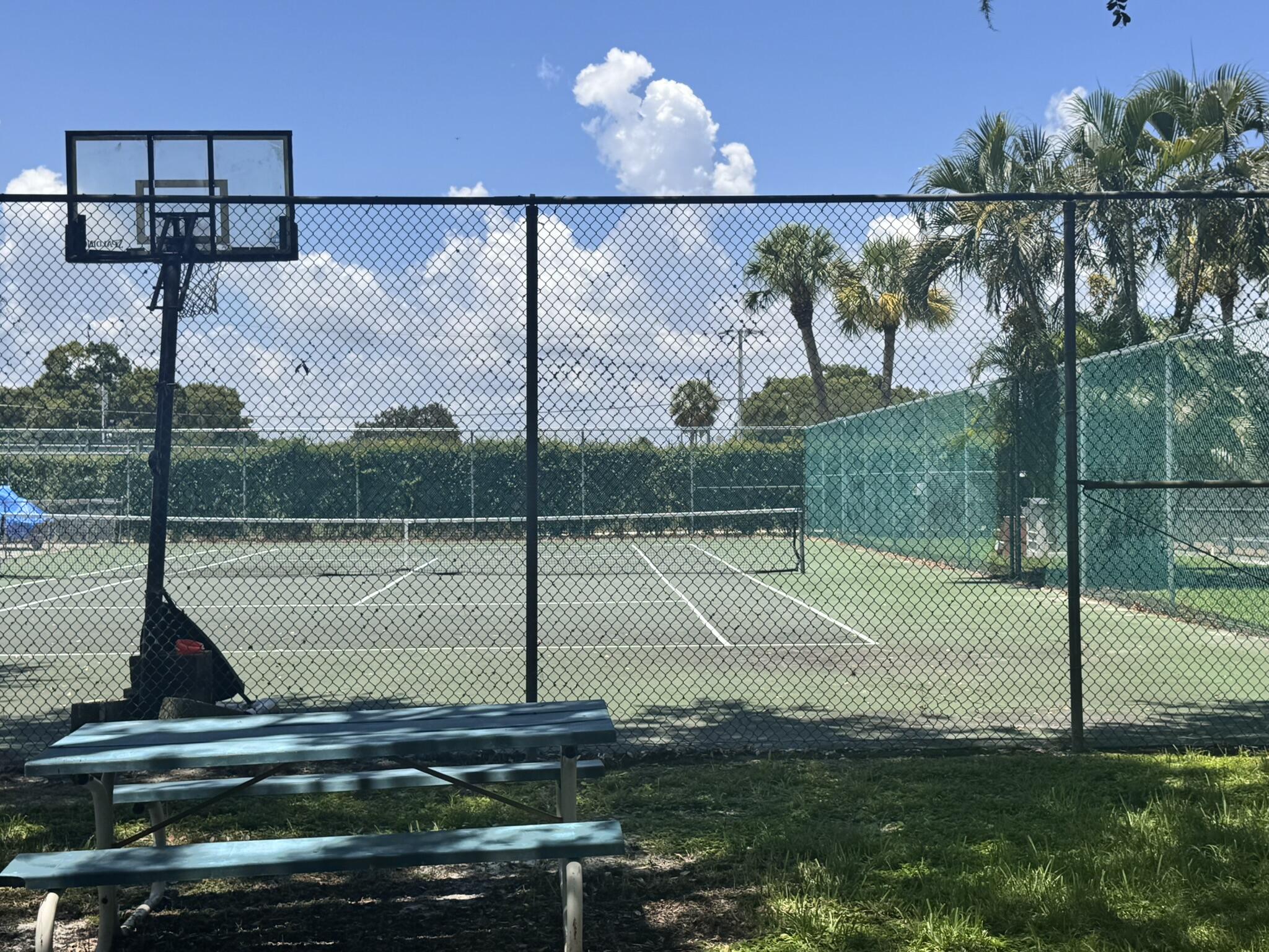 3124 Highway 441, Unit J1 Okeechobee, FL 34974 - Photo 37 of 40 a view of a swimming pool with a balcony