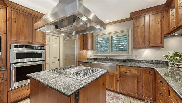a view of a livingroom with an empty space and a window
