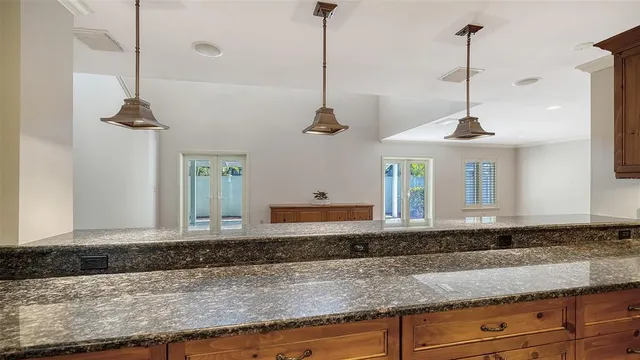 a view of a balcony with wooden floor