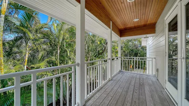 a bathroom with a sink a toilet and shower curtain