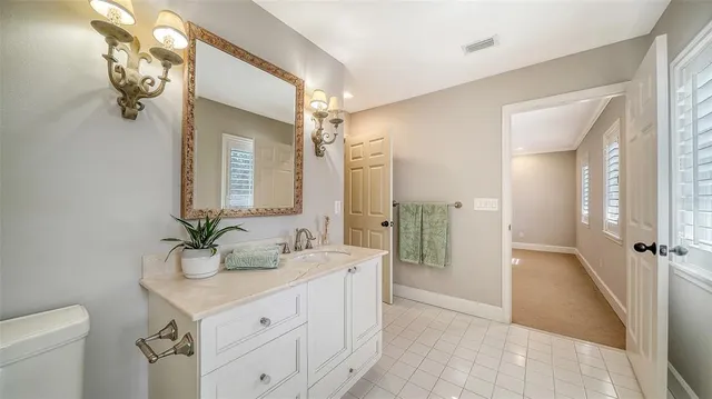 a view of a chairs and tables in patio