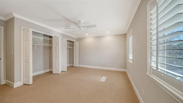 a backyard of a house with outdoor seating