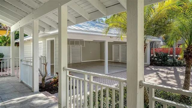 a view of a porch with wooden floor and outdoor space