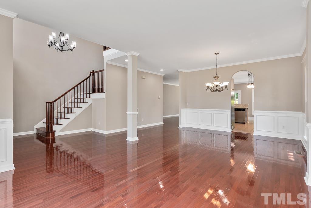 618 Red Cedar Circle Durham, NC 27712 - Photo 11 of 45 a view of entryway and hall with wooden floor