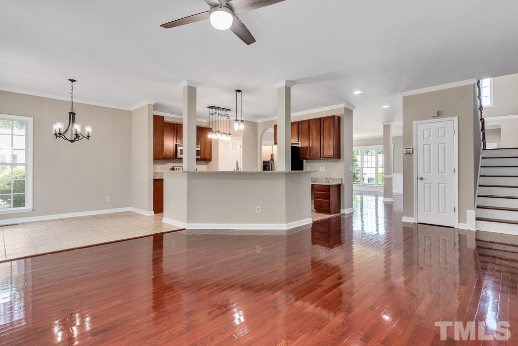 618 Red Cedar Circle Durham, NC 27712 - Photo 15 of 45 a view of a kitchen with wooden floor and a kitchen