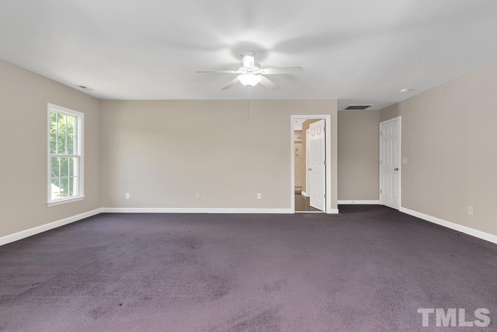 618 Red Cedar Circle Durham, NC 27712 - Photo 26 of 45 a view of an empty room with a window