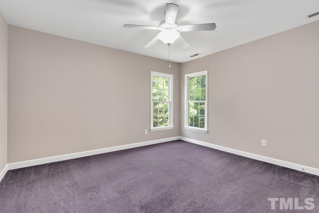 618 Red Cedar Circle Durham, NC 27712 - Photo 30 of 45 a view of room with window and ceiling fan