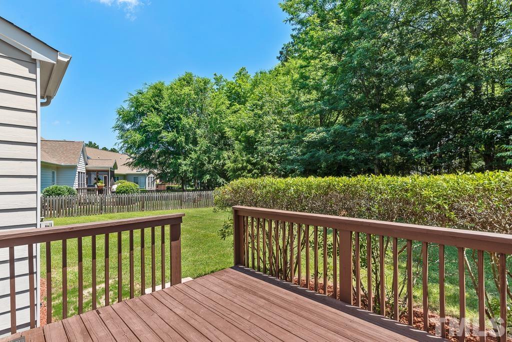 618 Red Cedar Circle Durham, NC 27712 - Photo 36 of 45 a view of balcony with wooden floor and fence