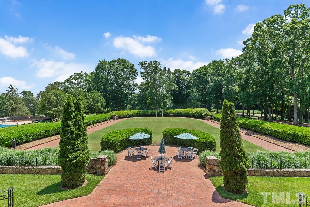 618 Red Cedar Circle Durham, NC 27712 - Photo 43 of 45 a view of a garden with sitting area