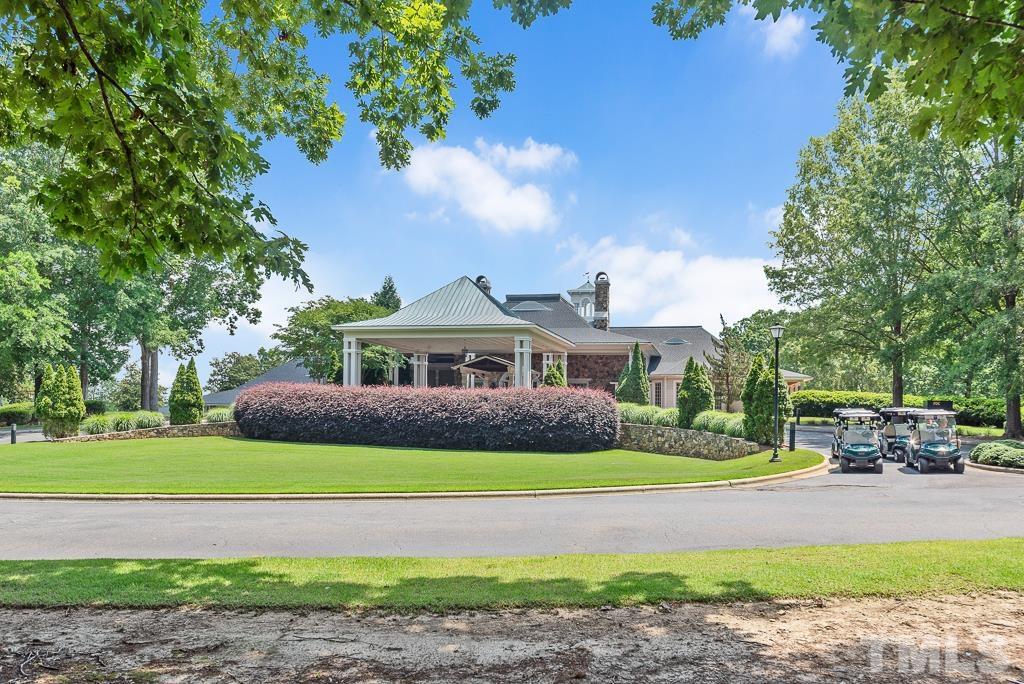618 Red Cedar Circle Durham, NC 27712 - Photo 45 of 45 a front view of a house with garden