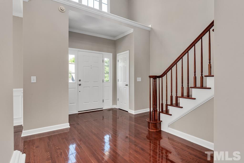 618 Red Cedar Circle Durham, NC 27712 - Photo 7 of 45 a view of an entryway with wooden floor