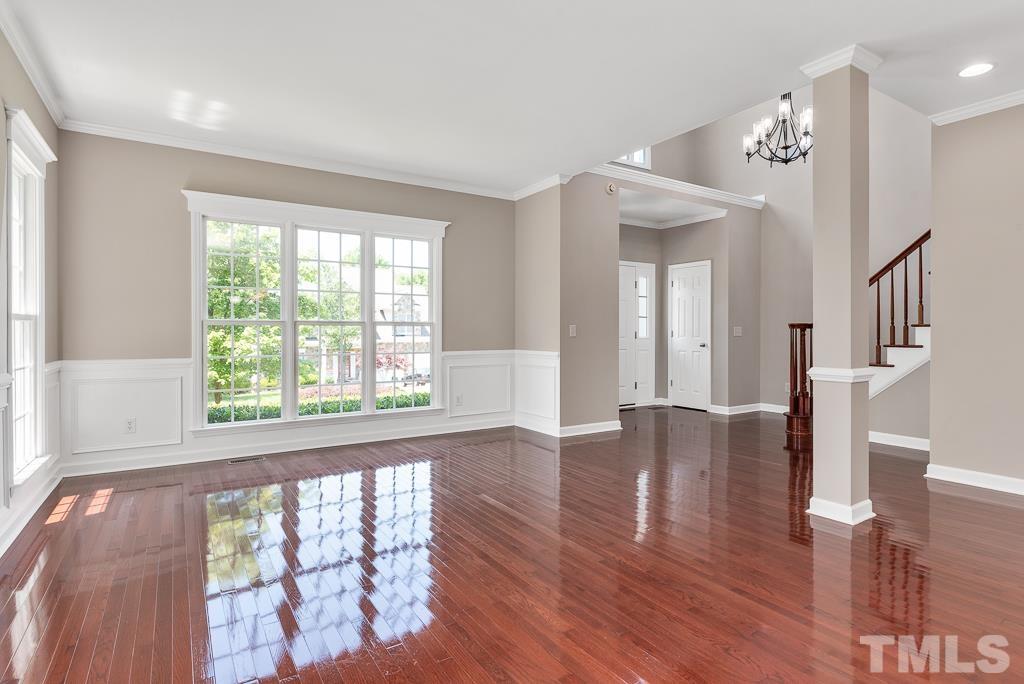 618 Red Cedar Circle Durham, NC 27712 - Photo 9 of 45 wooden floor in an empty room with a window