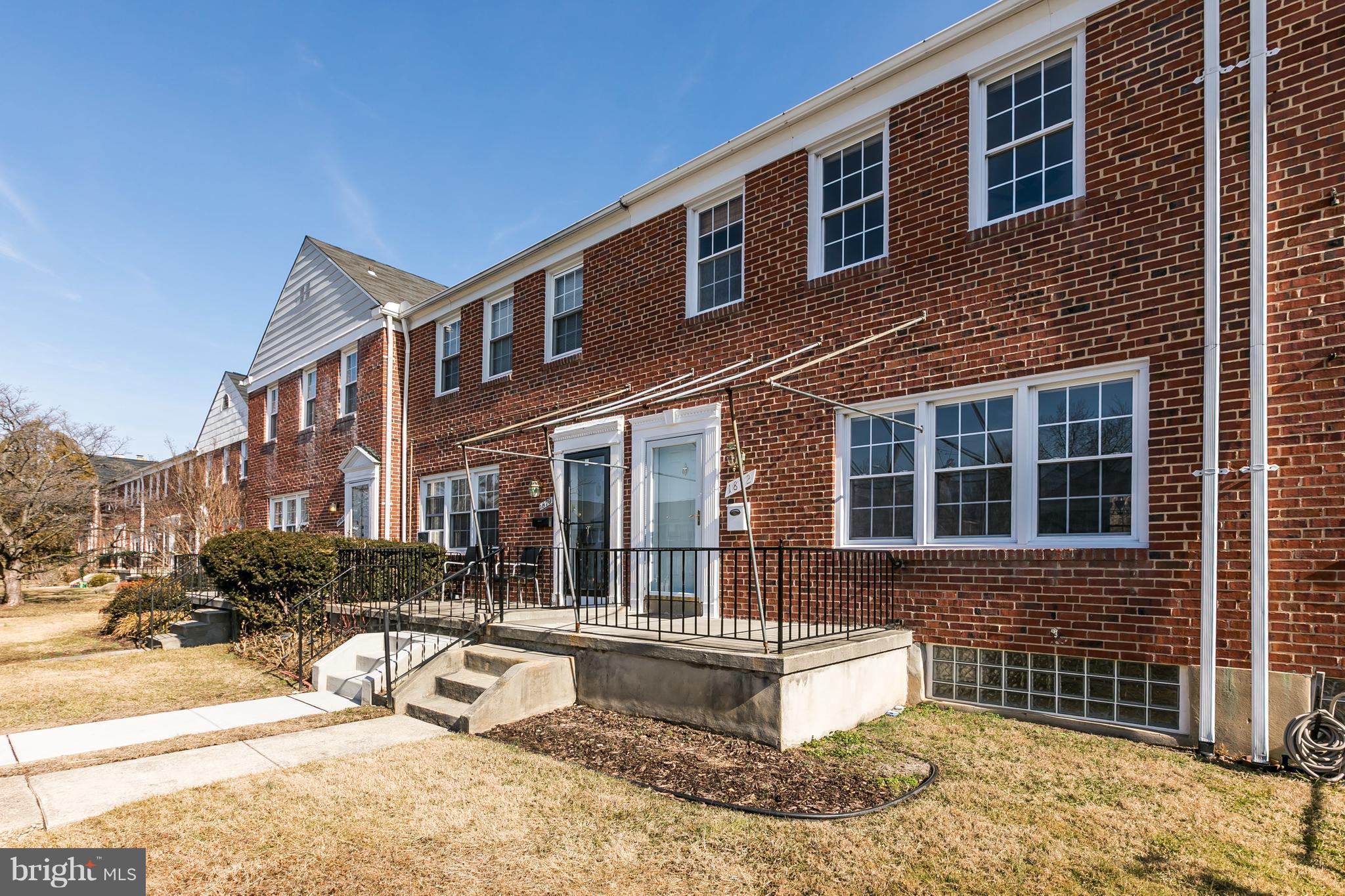 1872 Edgewood Road Towson, MD 21286 - Photo 1 of 17 a front view of a house with a yard