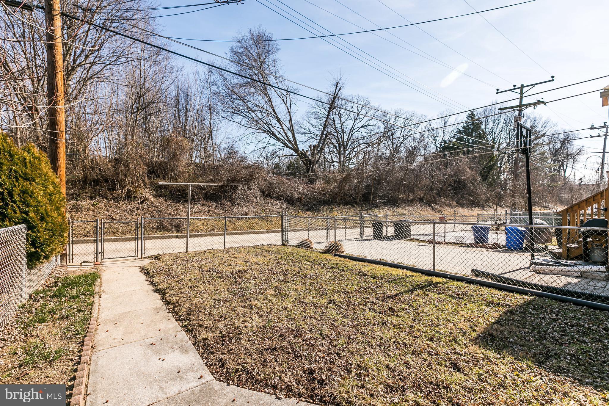 1872 Edgewood Road Towson, MD 21286 - Photo 16 of 17 a view of a yard and a wooden fence