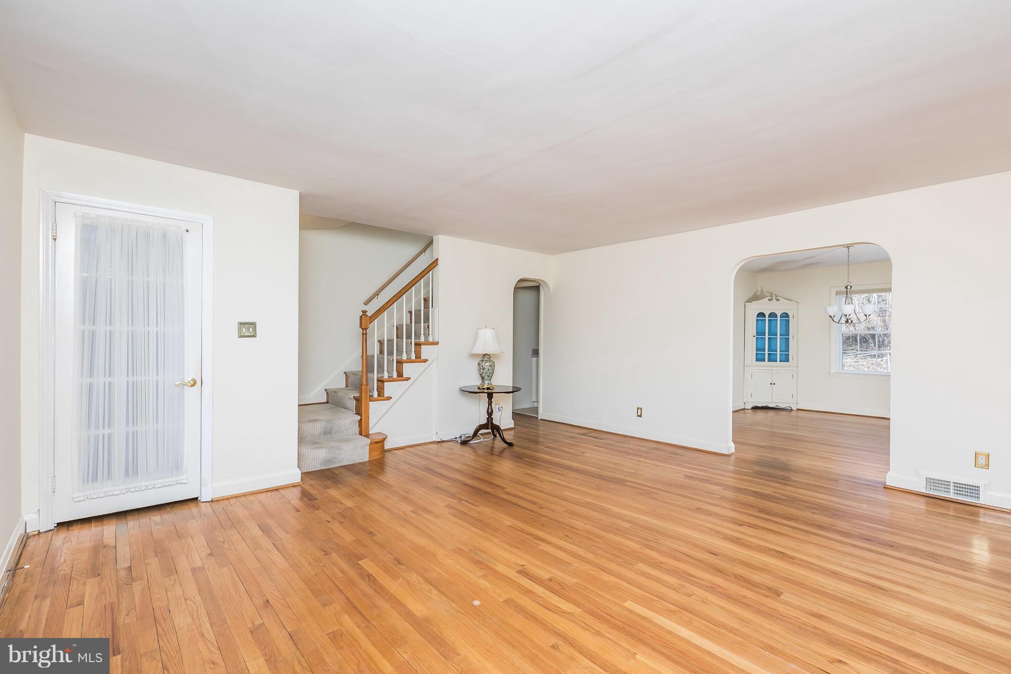 1872 Edgewood Road Towson, MD 21286 - Photo 3 of 17 a view of empty room with wooden floor