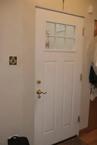 a work room with furniture and wooden floor