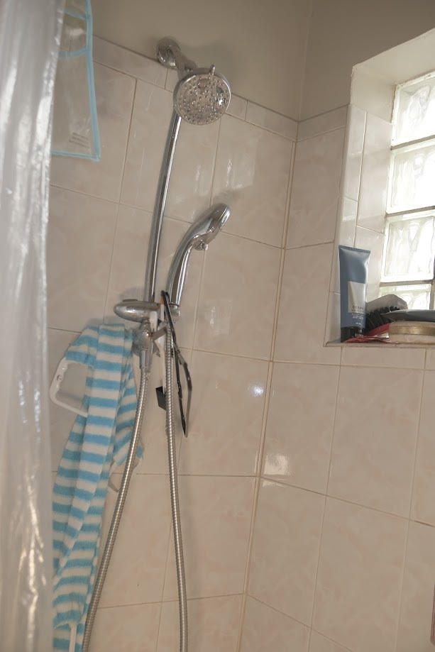 1651 West 79th Street Chicago, IL 60620 - Photo 18 of 29 a bathroom with a shower and a sink