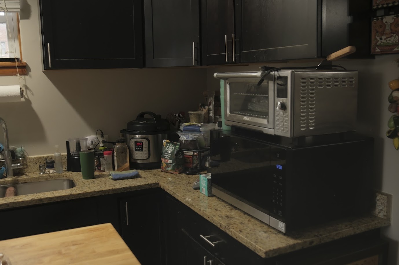 1651 West 79th Street Chicago, IL 60620 - Photo 19 of 29 a kitchen with a sink and cabinets