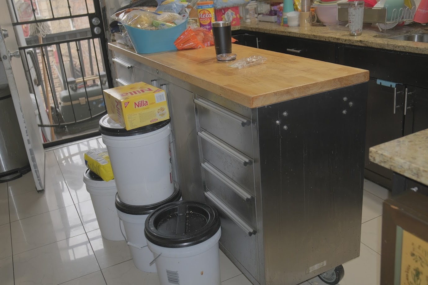 1651 West 79th Street Chicago, IL 60620 - Photo 22 of 29 a kitchen with a sink and a stove