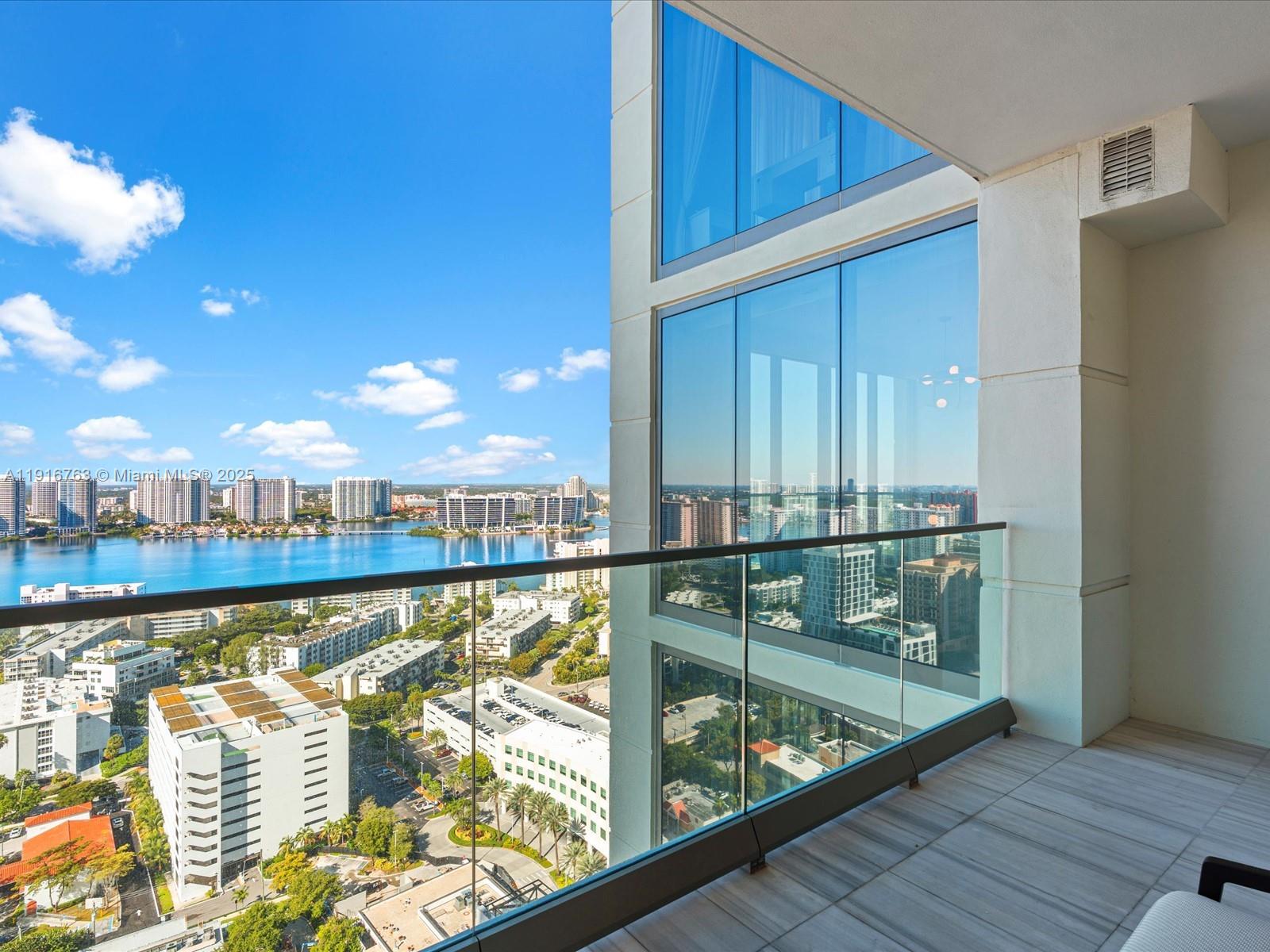 17901 Collins Avenue, Unit 2602 Sunny Isles Beach, FL 33160 - Photo 60 of 85 a view of swimming pool from a balcony