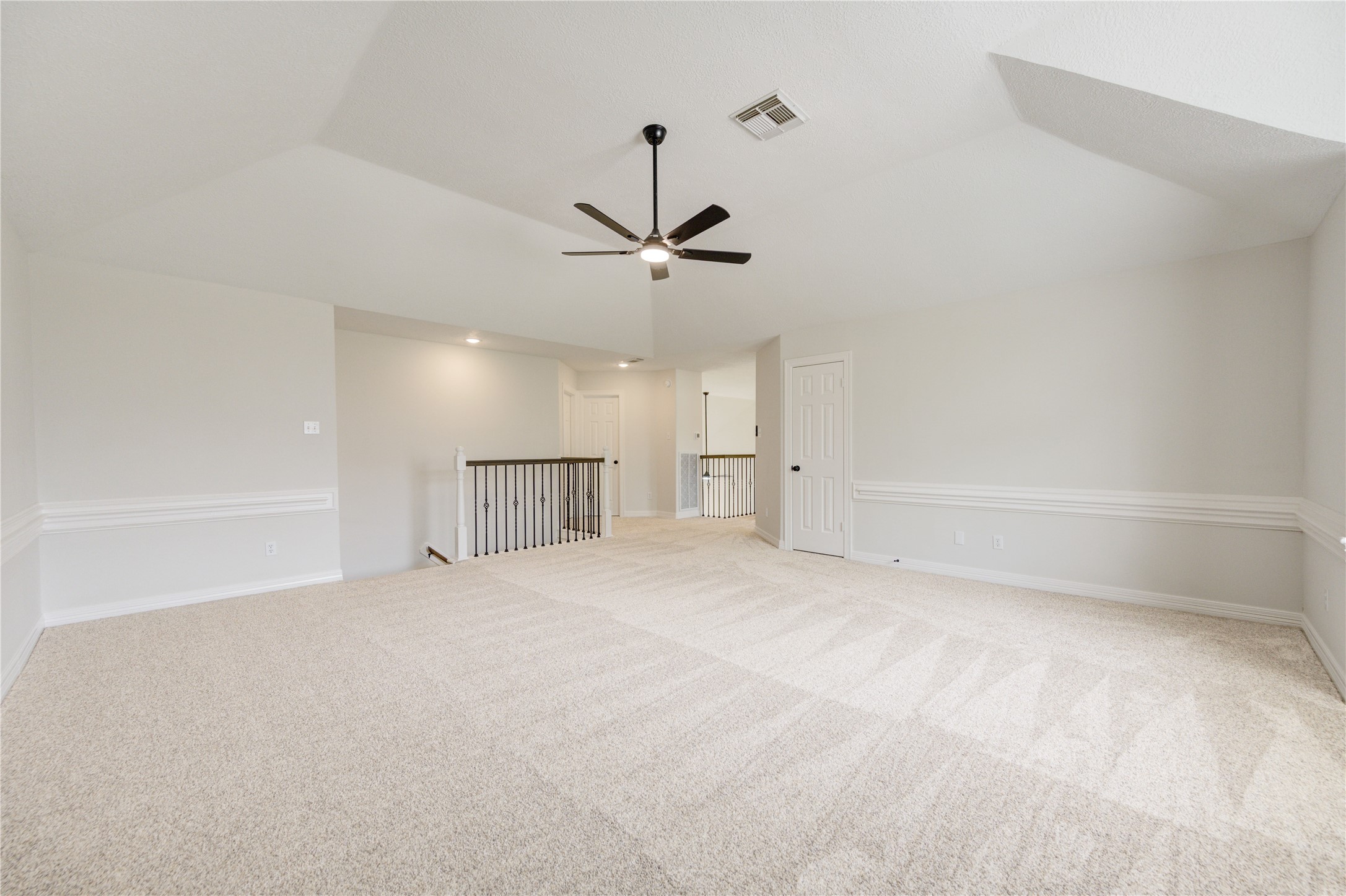 17318 Bonnard Circle Spring, TX 77379 - Photo 40 of 45 There is a second staircase from the game room in case you want to run downstairs to grab a late night snack! This staircase leads you to the family area of the home.