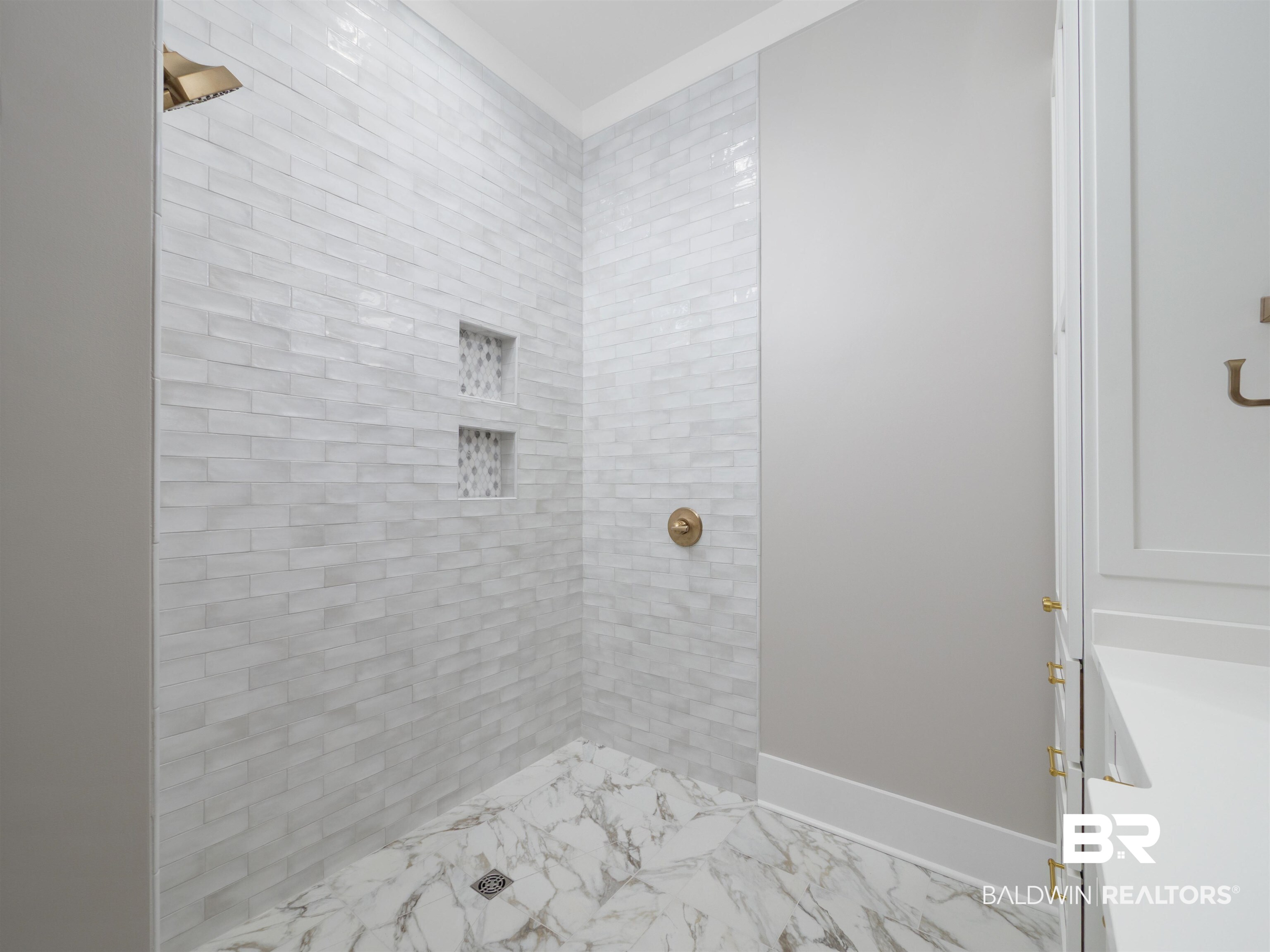 10912 Catania Avenue Fairhope, AL 36532 - Photo 36 of 54 There will be glass to separate the shower from the remainder of the bathroom, builder is waiting on it to arrive