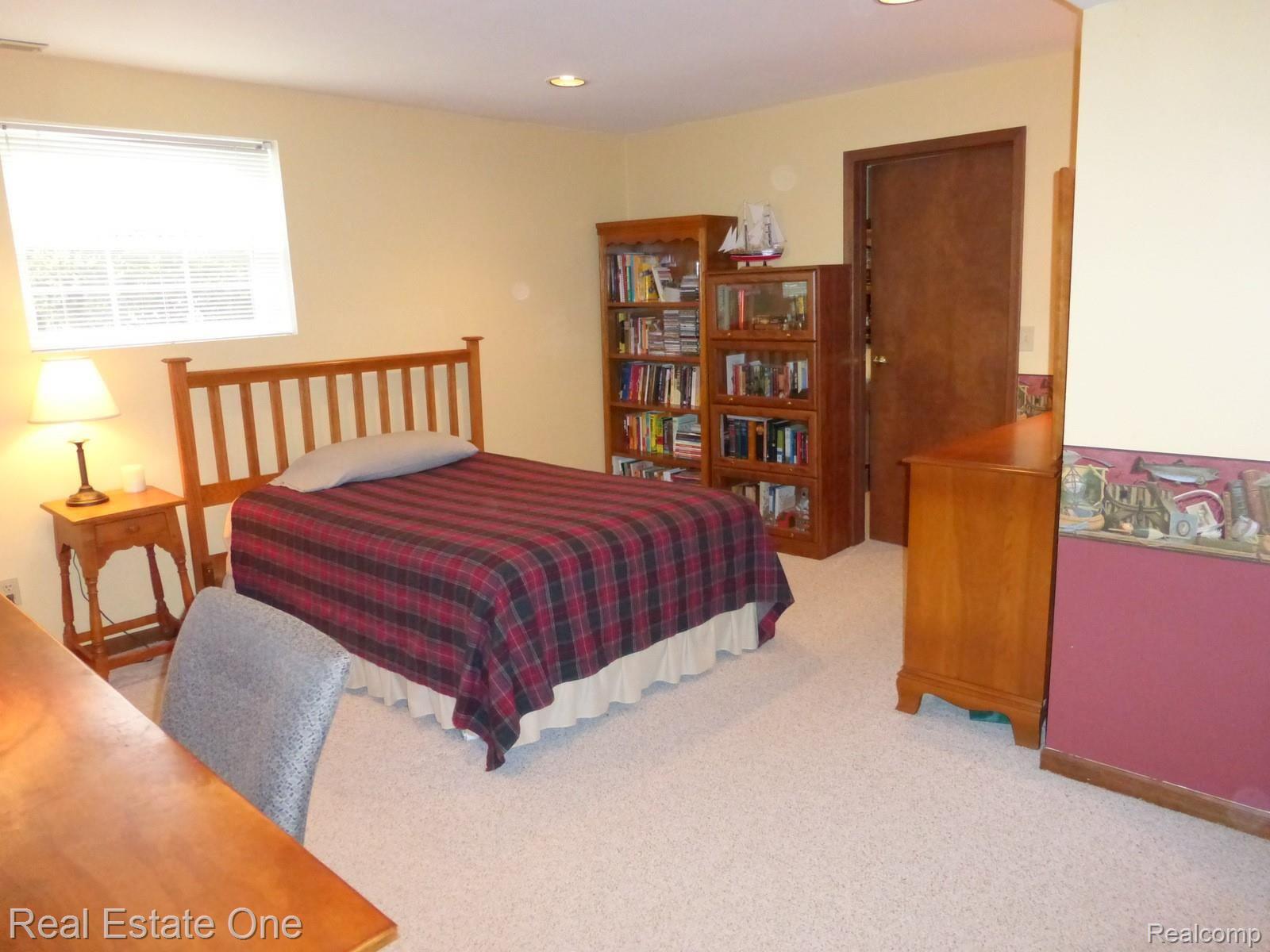 645 Hidden Ridge Drive Troy, MI 48083 - Photo 26 of 43 Another angle of this Bedroom...door leads to a flex room...nursery, private office, snore room, or make into a walk-in closet!