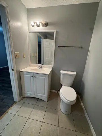 a view of balcony with wooden floor