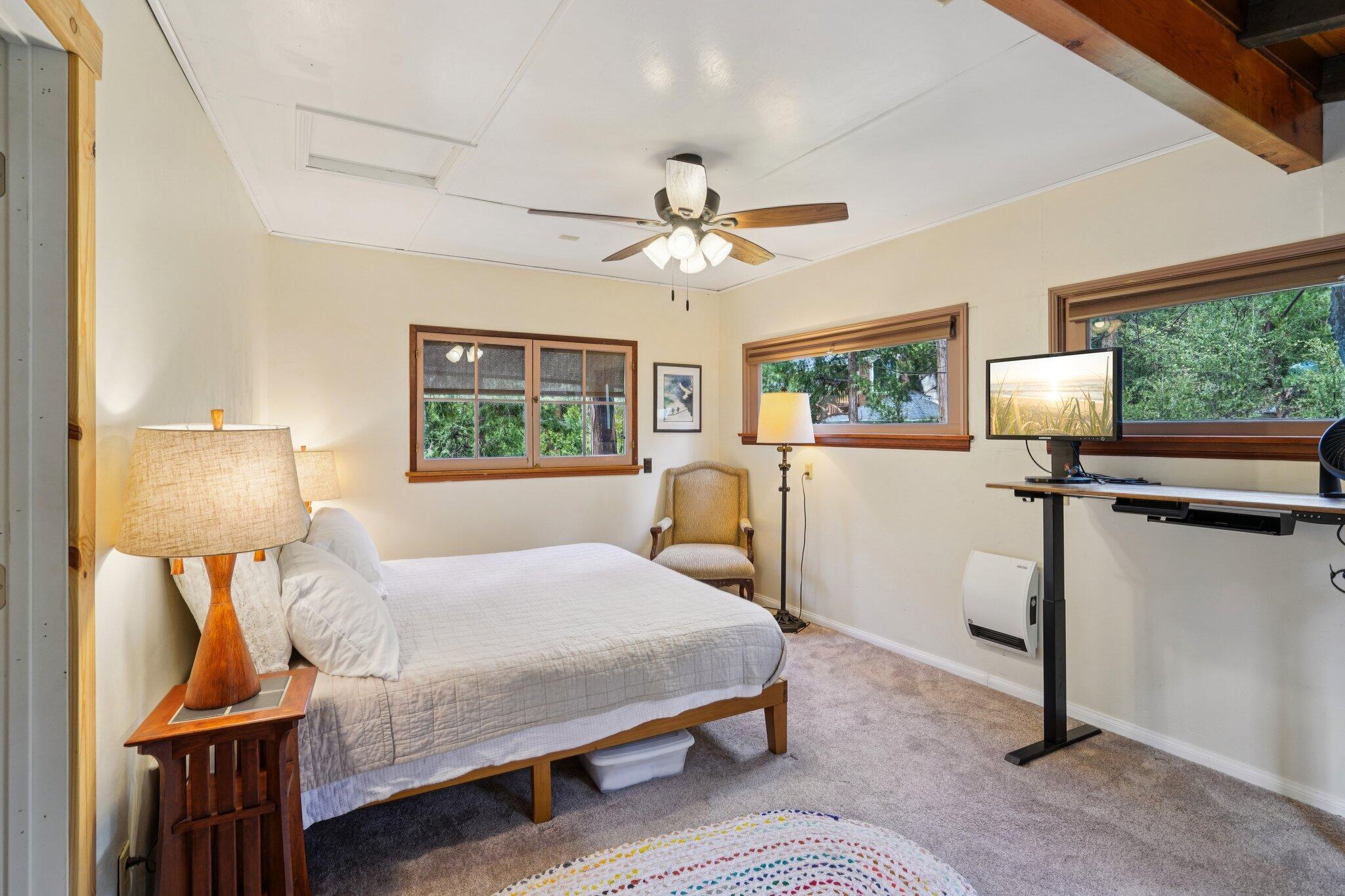 55280 Circle Way Idyllwild, CA 92549 - Photo 23 of 27 a bedroom with a bed chandelier and a window