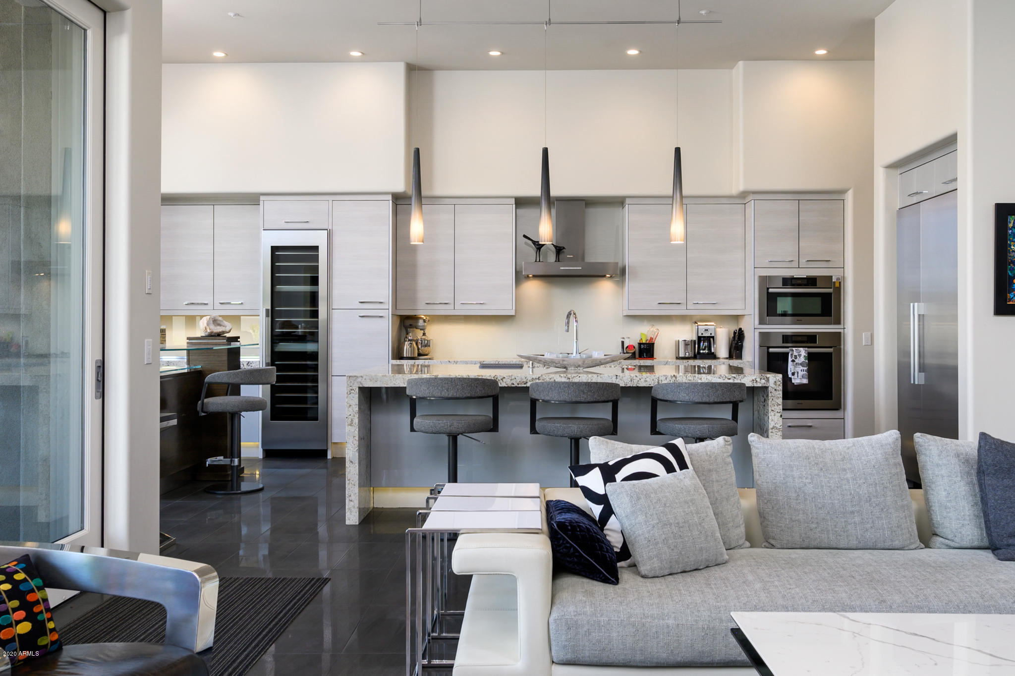 7953 East Thunderhawk Road Scottsdale, AZ 85255 - Photo 12 of 40 a living room with stainless steel appliances furniture and kitchen view