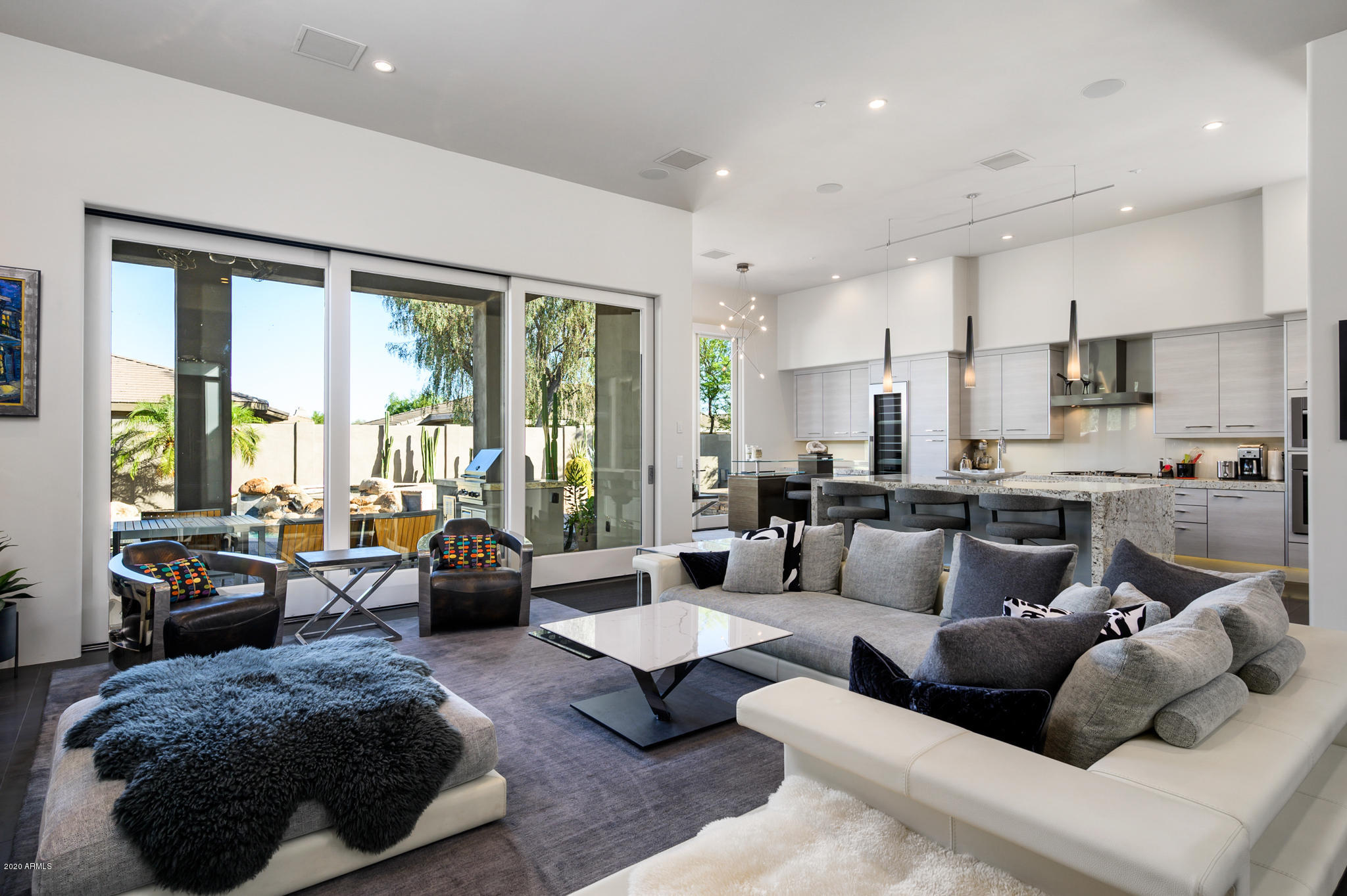 7953 East Thunderhawk Road Scottsdale, AZ 85255 - Photo 13 of 40 a living room with furniture and large windows